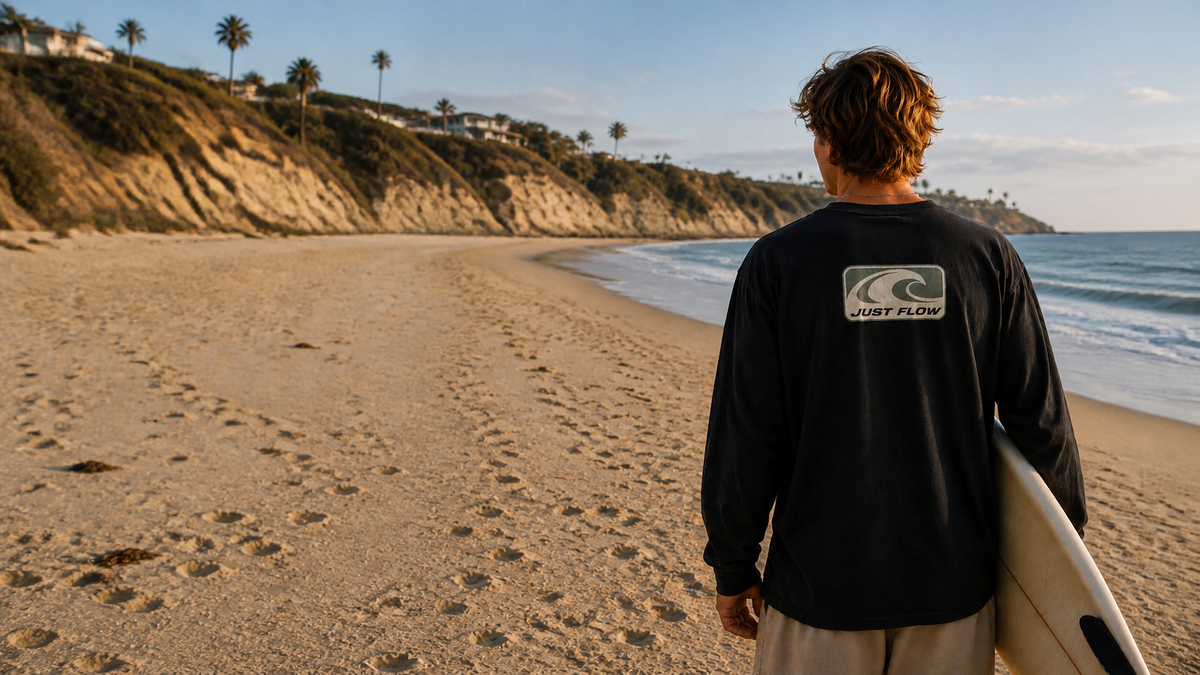 Wave Badge Long Sleeve Tee on the beach - Just Flow