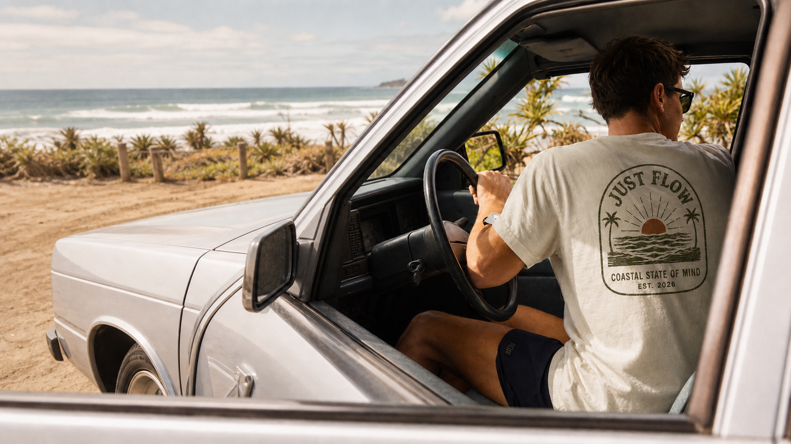 Coastal Sunset Heavyweight Tee on a coastal drive - Just Flow