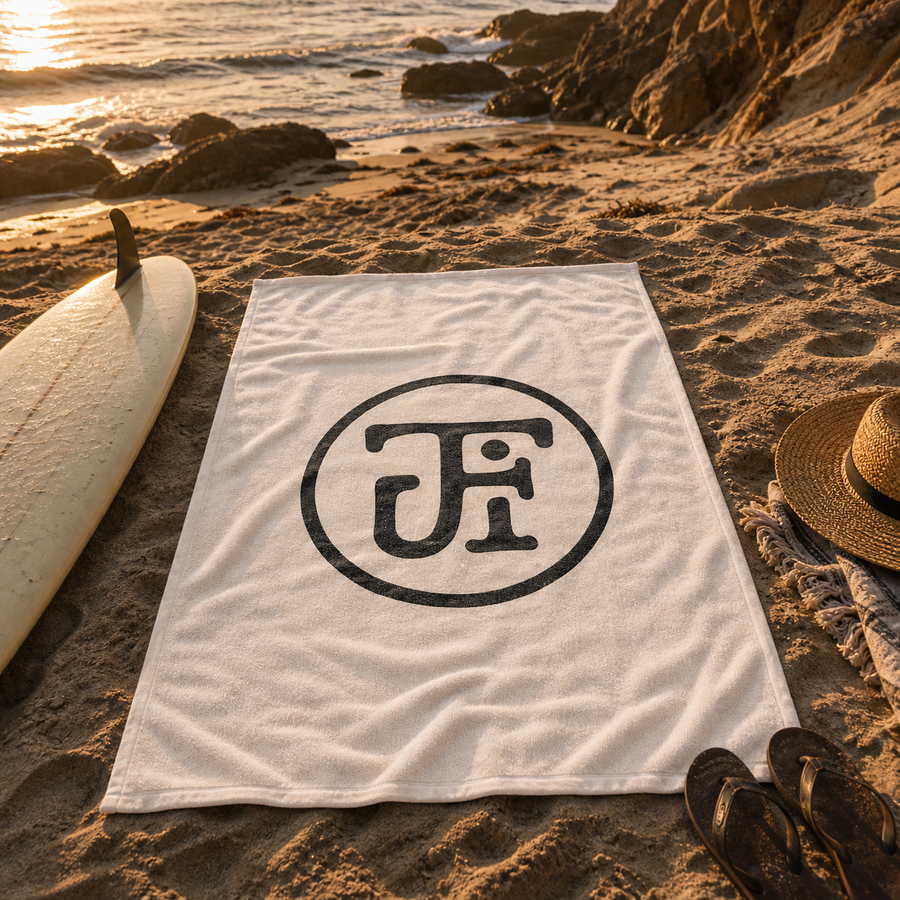 Monogram beach towel on the sand