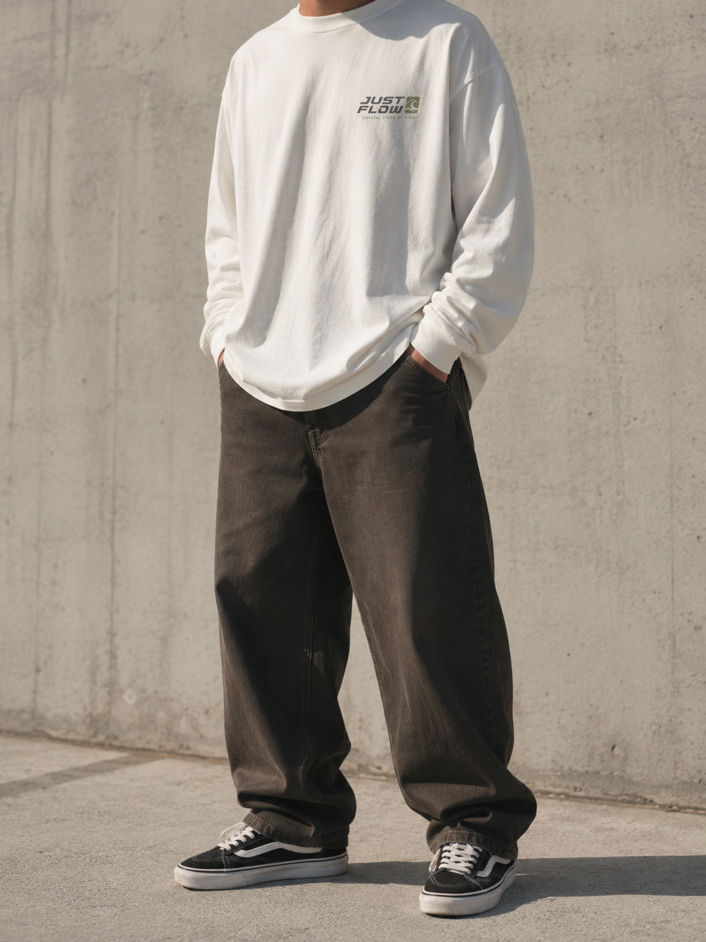 Coastal Long Sleeve Tee in vintage white, concrete wall