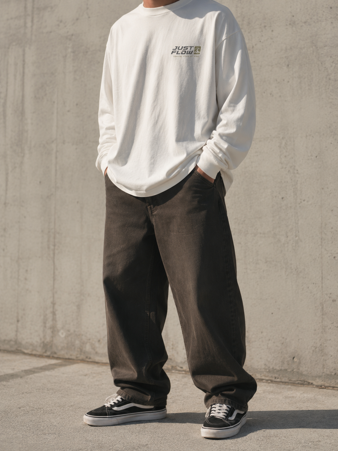 Coastal Long Sleeve Tee in vintage white, concrete wall