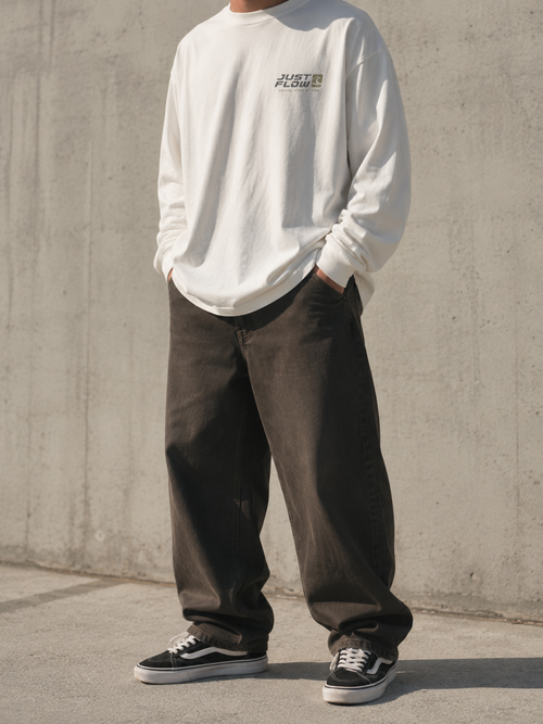 Coastal Long Sleeve Tee in vintage white, concrete wall
