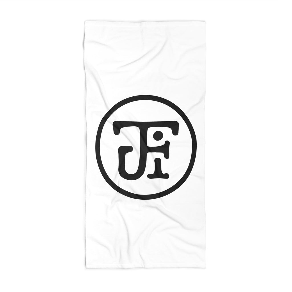 Monogram beach towel, flat product shot, monogram upright