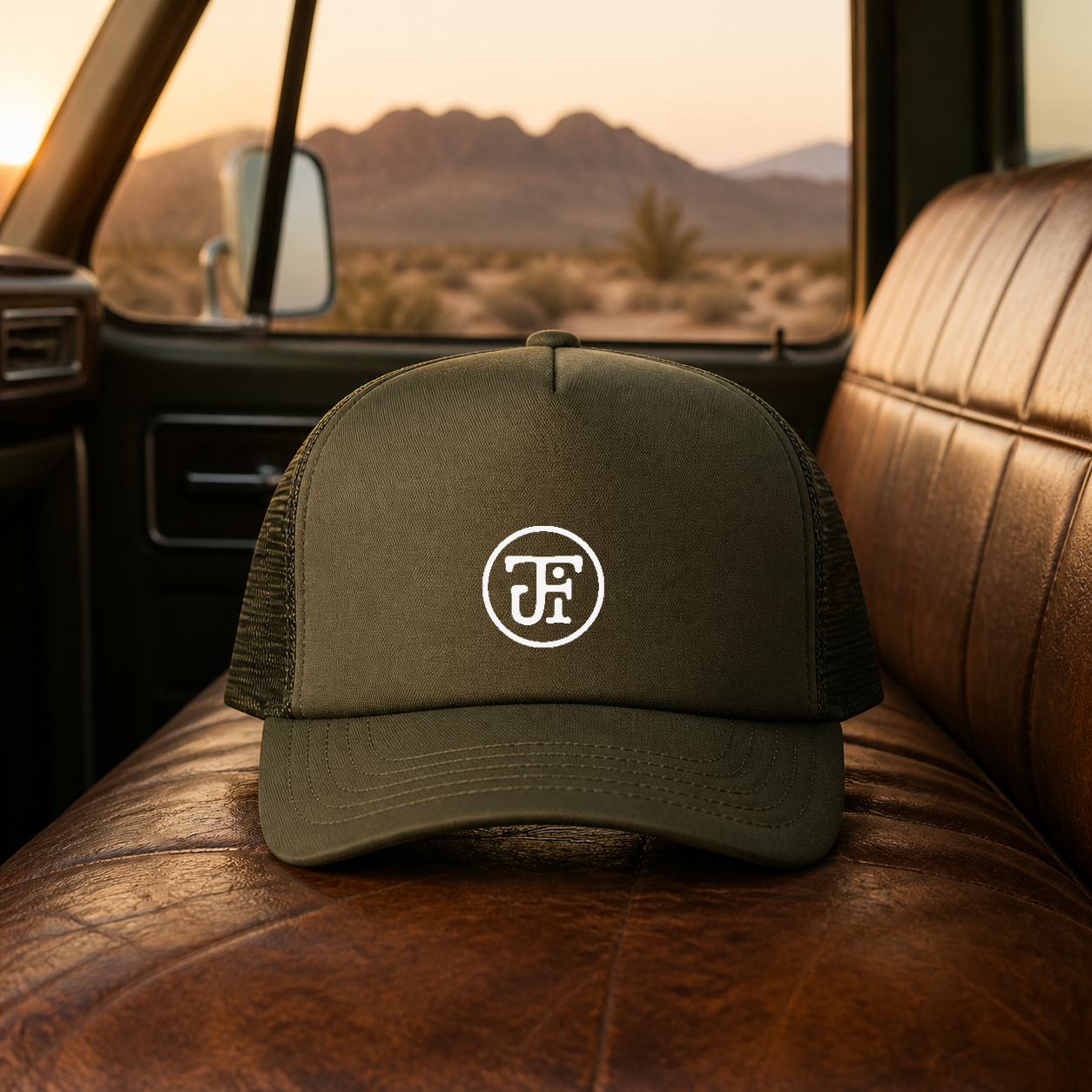 JFI Monogram Embroidered Trucker Cap in Loden, front embroidery