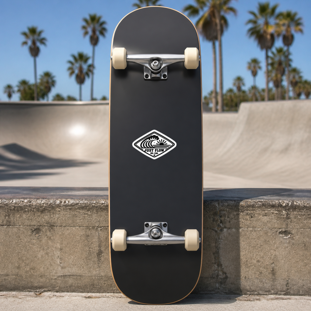 Horizontal Wave Diamond sticker, black mark on white, on a charcoal skateboard underside