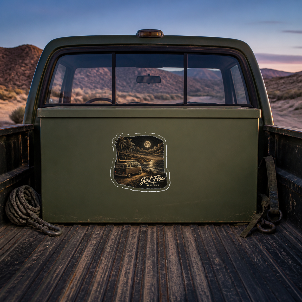 Just Flow After Dark Moonlight Bus sticker on an olive truck-bed toolbox