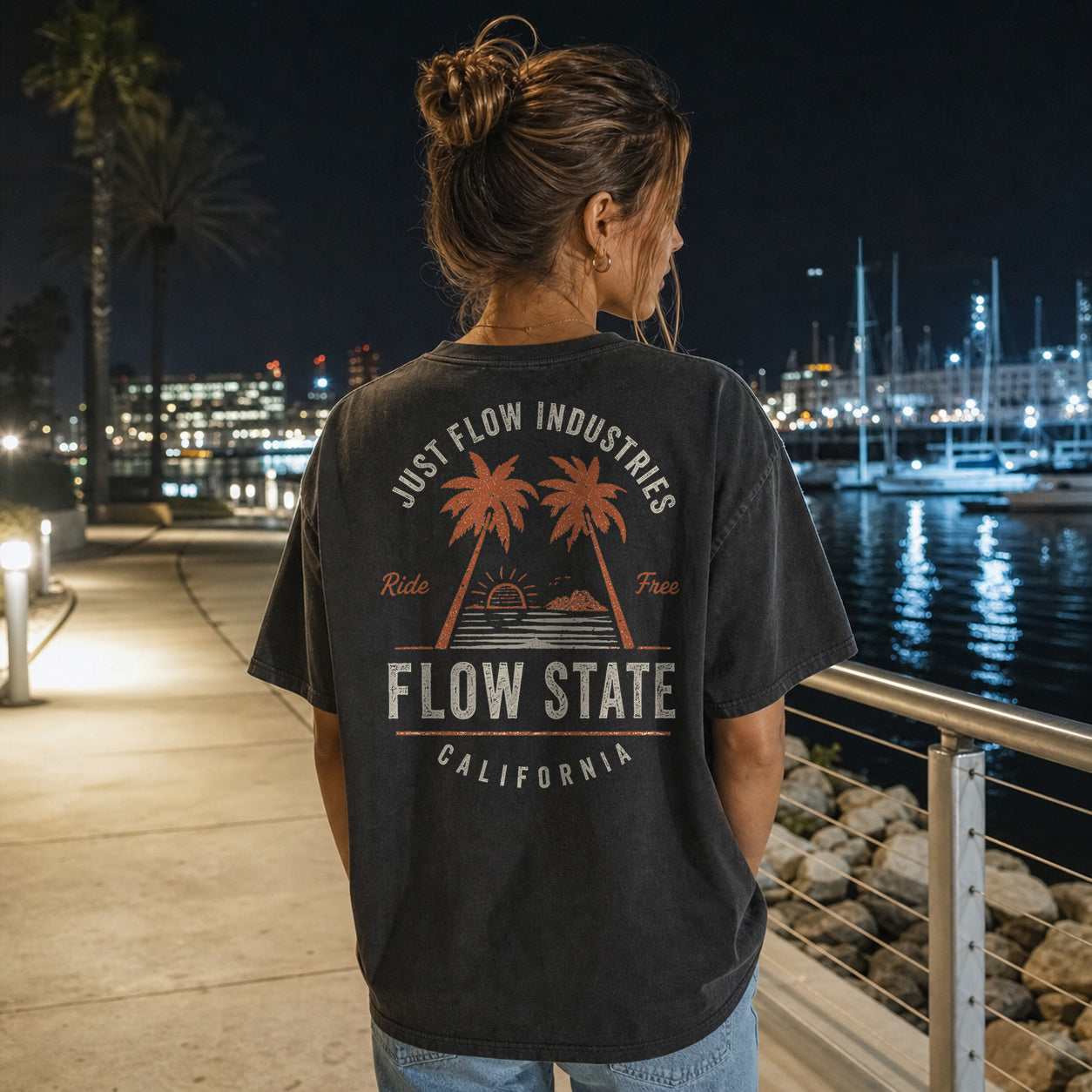 Flow State DTF Heavyweight Tee, worn back print at the harbor at night, California lifestyle