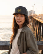 JFI monogram trucker cap in gold, San Diego