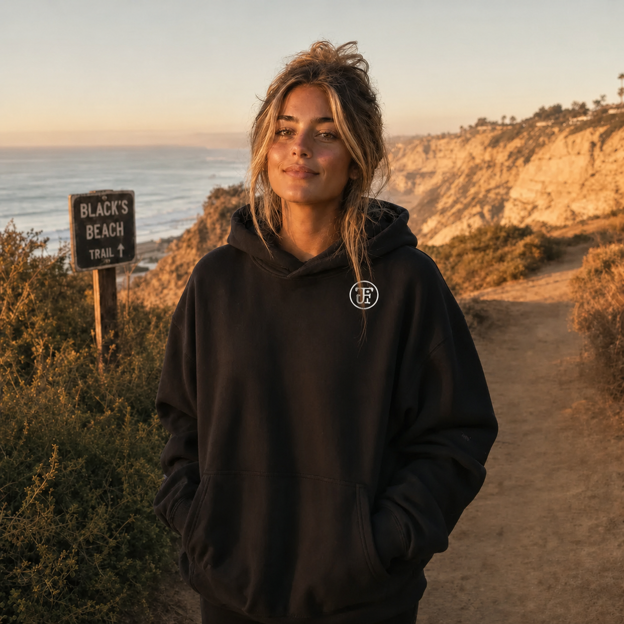 Monogram embroidered hoodie lifestyle hero, Southern California coast