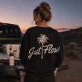 Black palm script fleece crew at a desert tailgate, dusk