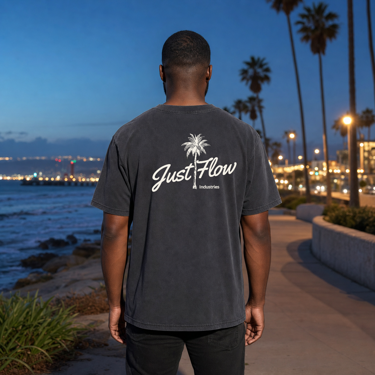 Palm Script washed tee in graphite, back print lifestyle hero
